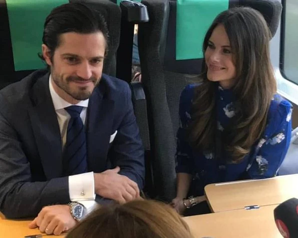 Princess Sofia wore 2ndDay Checked Duster Coat. Frödingskolan School in Kronopark. secondary school teacher Soran Afrasiabi