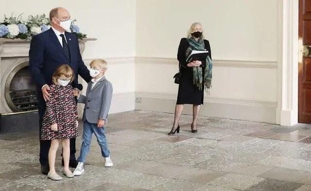 Princess Gabriella wore an evita corduroy dress by Jacadi. President Michael D Higgins and Sabina. Princess Charlene