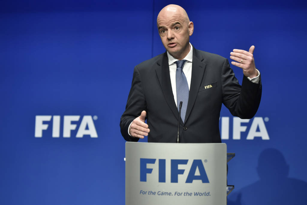 Infantino diz que intenção da Fifa com novo formato é expandir e desenvolver o futebol pelo mundo (Foto: Michael Buholzer/AFP) Infantino diz que intenção da Fifa com novo formato é expandir e desenvolver o futebol pelo mundo (Foto: Michael Buholzer/AFP)