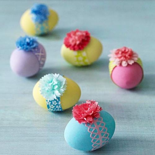 pretty Easter eggs with colorful ribbons
