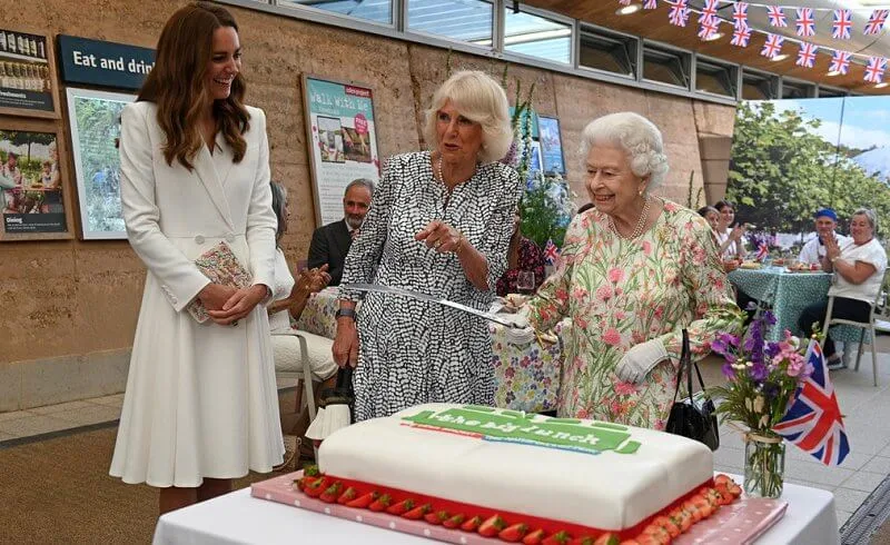 Queen in a floral outfit, Kate  in white coat dress, Carrie Johnson, wore a dressby Vampire’s Wife, Jill Biden in trench coat