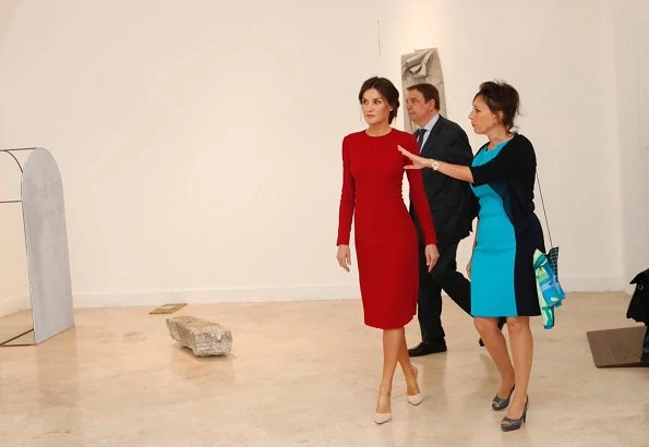 Queen Letizia wore Carolina Herrera red dress, carried Felipe Varela clutch bag. Queen visited the Spanish Royal Academy in Rome