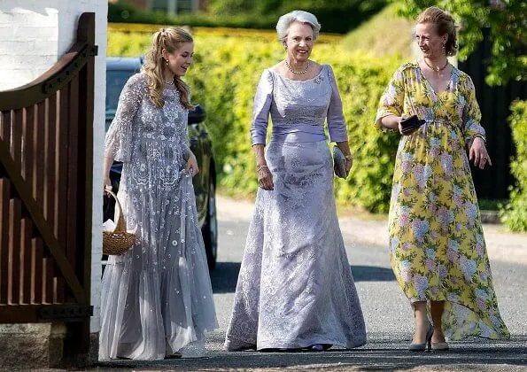 Princess Alexandra is wearing the Ahlefeldt-Laurvig-Bille floral tiara, wedding lace dress. Princess Nathalie and Princess Sumaya