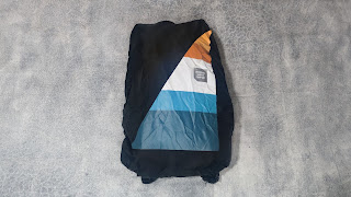 Backpack with rain cover on