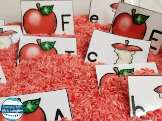 Sensory bins are a great way to incorporate play in your kindergarten or preschool centers. These apple cards are fun to hunt in a sensory bin full of fun rice! This blog post includes step by step directions on how to make easy sensory bin rice with materials you probably have at home! Throw in a few fun items from the Dollar Store and this is an easy DIY project. #kindergartenclassroom #preschoolclassroom #kindergarten #prek 