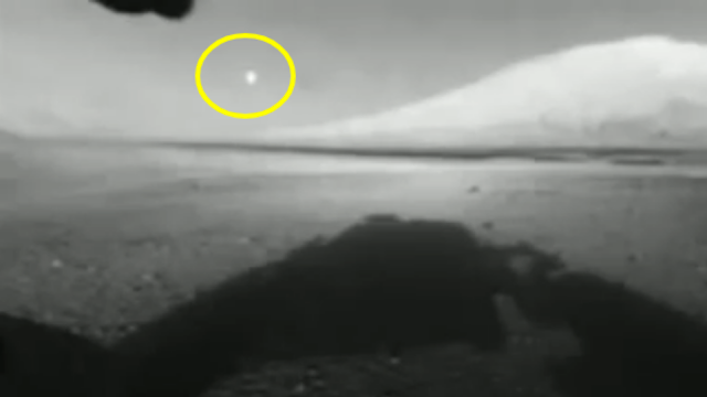 UFO flies right toward the Rover then sees it and darts for cover behind a mountain.