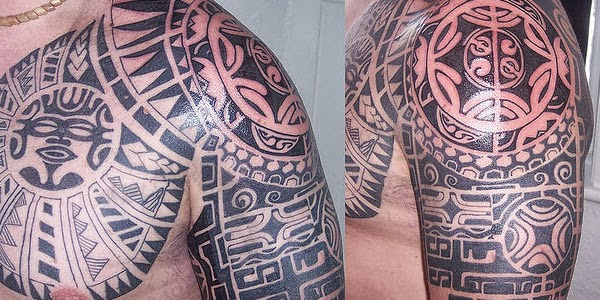 Tatuaje tribal en el hombro y en el pecho