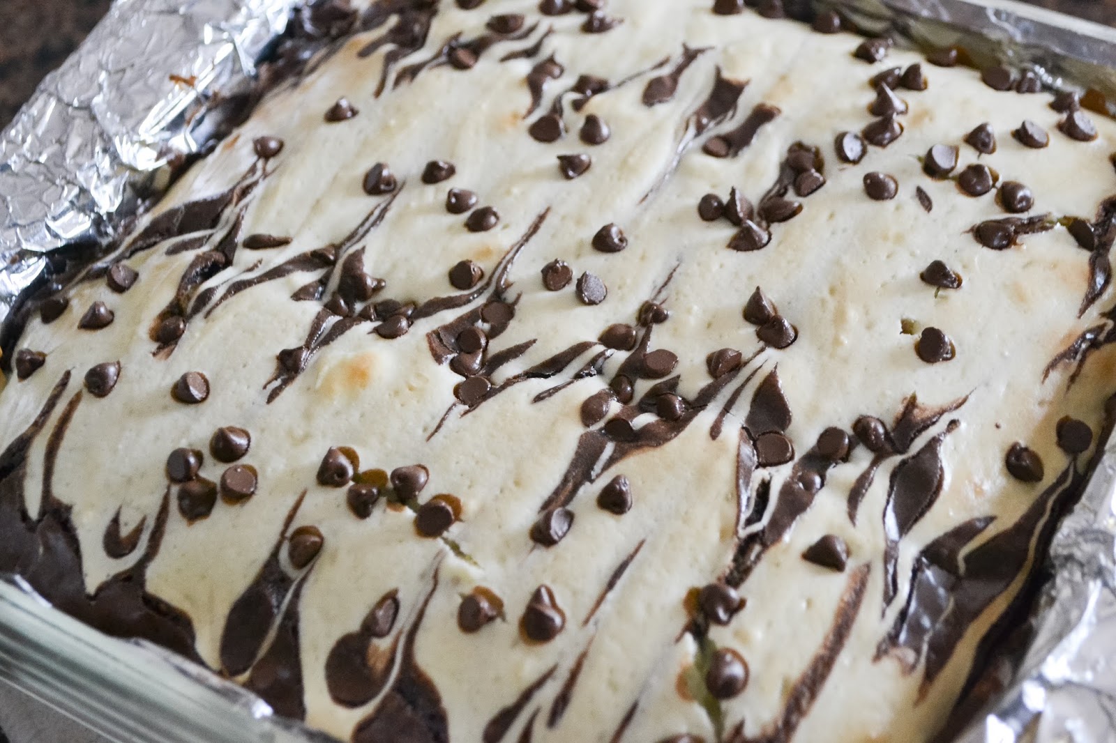 Cast Iron Stew Cheesecake Brownies