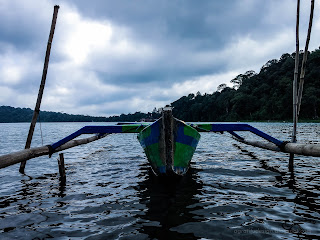 Jukung Traditional Paddle Canoe On The Lake Water Of Beratan At Bedugul, Tabanan, Bali, Indonesia