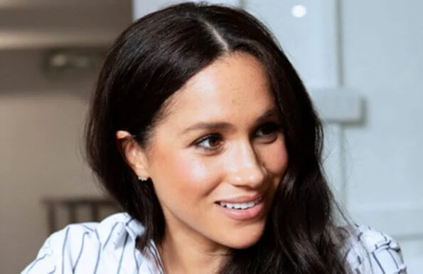 Meghan Markle wore WNU shirt, J.Crew Juliette blazer, Adina Reyter three diamond earrings, Adidas Stan Smith sneakers