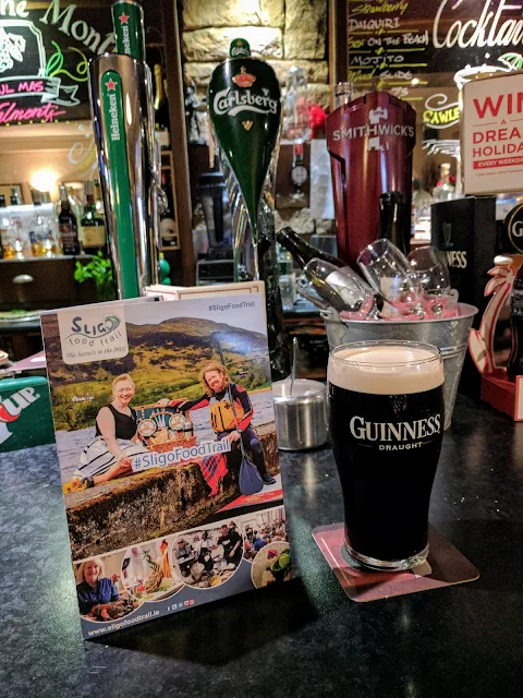 Pint of Guinness and the Sligo Food Trail brochure at Cawley's Guesthouse in Tubbercurry Sligo Ireland