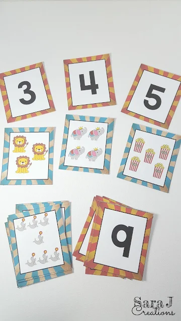 Free number cards and matching picture cards with a circus theme.  Perfect for sequencing numbers, matching number and picture and practicing counting.