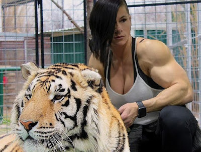 Kristen nun in a cage with tiger