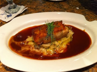 Potato-wrapped Red Snapper with Creamy Leek Fondue and Red Wine Reduction- Flying Fish