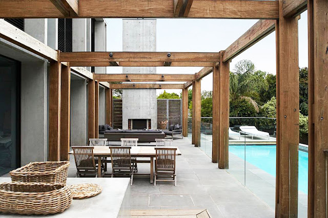 Terrace with wooden structure and swimming pool