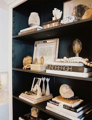 dark shelving with white accessories