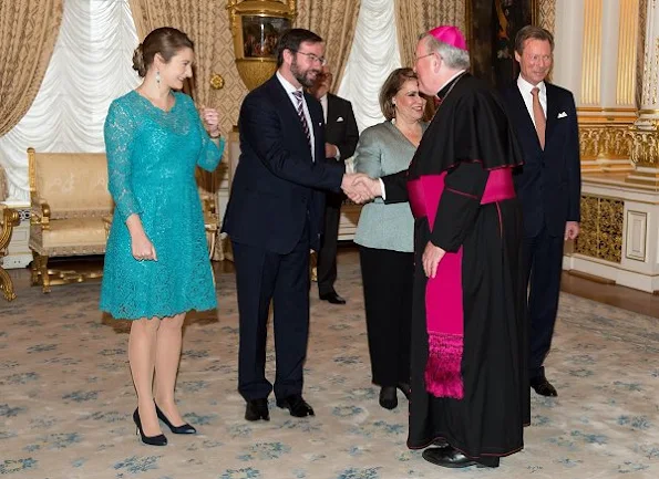 Prince Guillaume and Princess Stéphanie at New Year's reception. Princess Stéphanie wore Prada Lace Dress and Prada leather pumps, shoes, diamond earrings