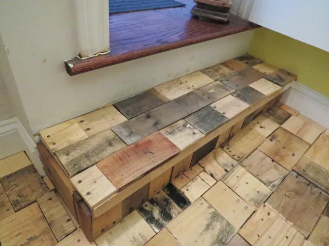 laying out pallet wood pieces on the small step