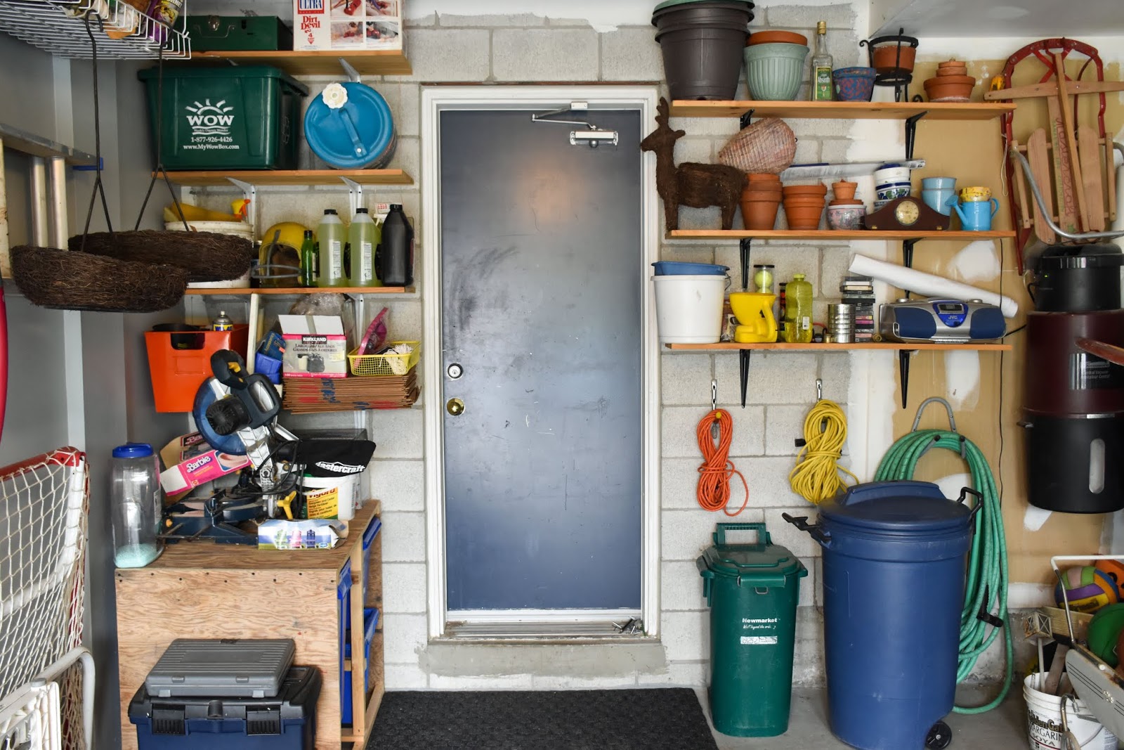 Woman in Real Life Garage Entry Door Paint and Trim Makeover & Garage