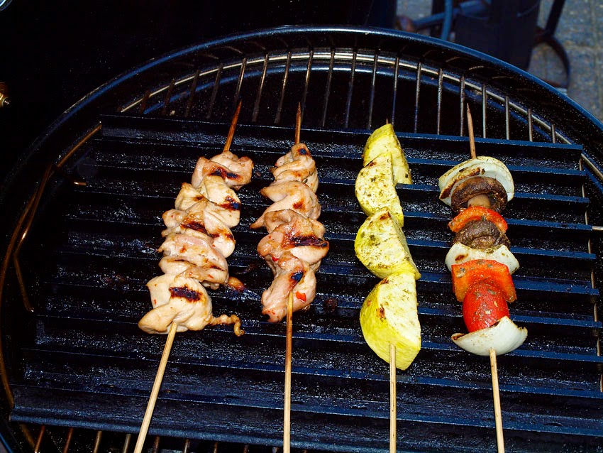 Pellet Smoker Cooking Chicken and Veggie Kabobs