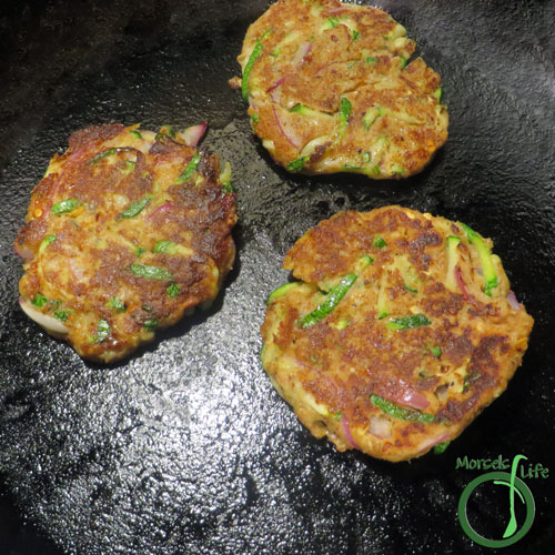 Morsels of Life - Zucchini Cakes Step 3 - Pan fry zucchini cakes until browned, and then flip and brown on other side.