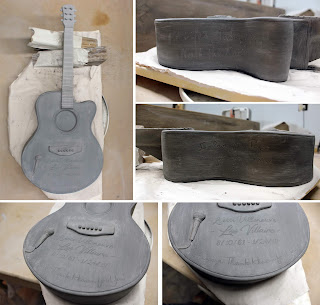 Engravings in Clay Urn Guitar