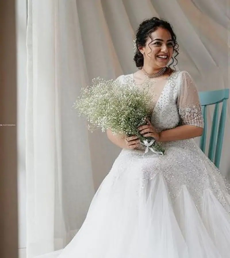 Actress Nithya Menen Photos Latest Hot Photos in White Dress Actress Nithya Menen Photos Latest Hot Photos in White Dress