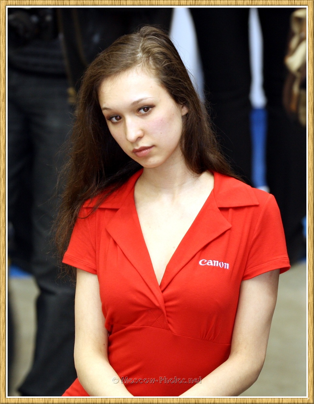Canon promo girl in red dress at Photoforum 