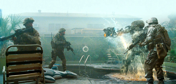 U.S. Marines confront an alien attacker in BATTLE: LOS ANGELES.