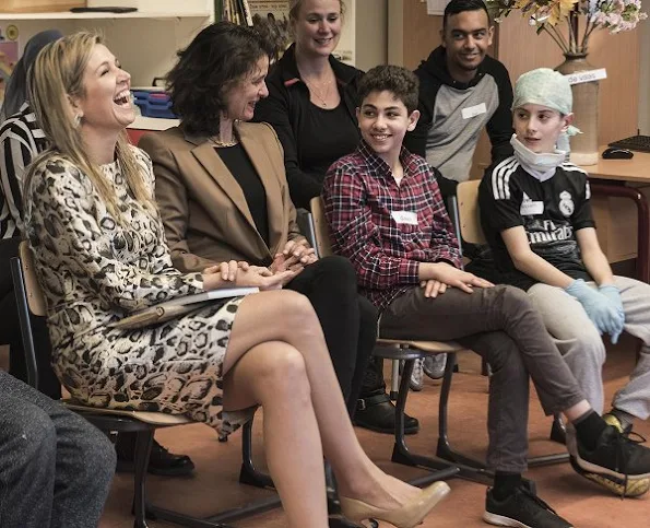 Queen Maxima of The Netherlands visited the IMC Weekendschool in Haarlem. Queen Maxima wore Natan Dress