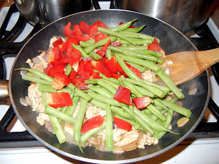 Adding in red pepper and green beans