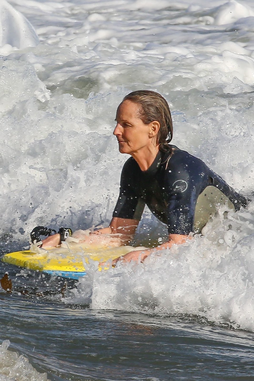 Helen Hunt Clicked in Wetsuit Bodyboarding at a Beach in Malibu 13 Jun2020