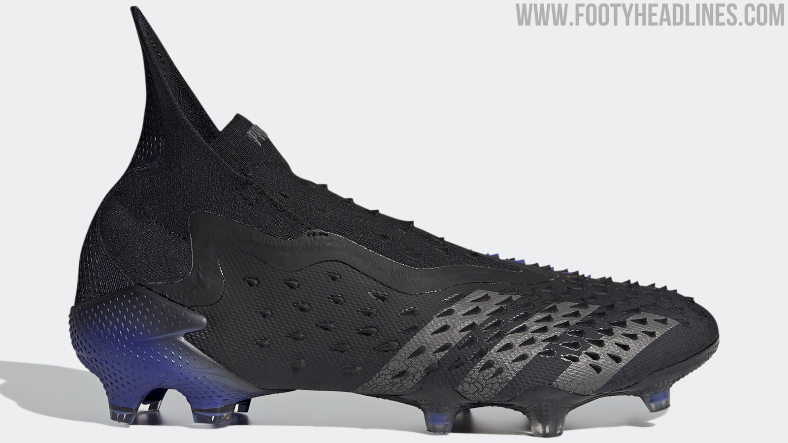 black and blue adidas predators