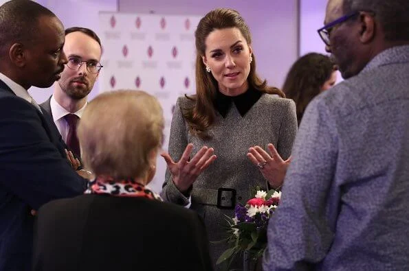 The Duchess wore a dress by Catherine Walker. Kate Middleton wore Catherine Walker dress for the UK's Holocaust Memorial Day Ceremony