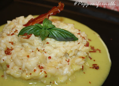 risotto ai cuori di carciofo su vellutata di patate e briciole di pancetta tostata.