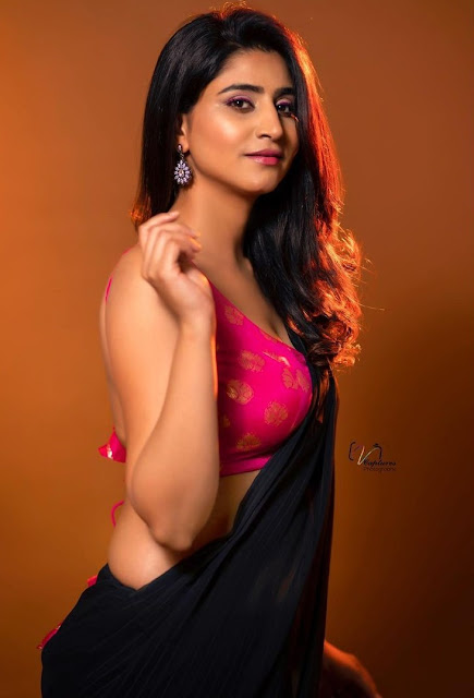 Actress Varshini Sounderajan New Hot Photo Stills in Black Saree Navel Queens
