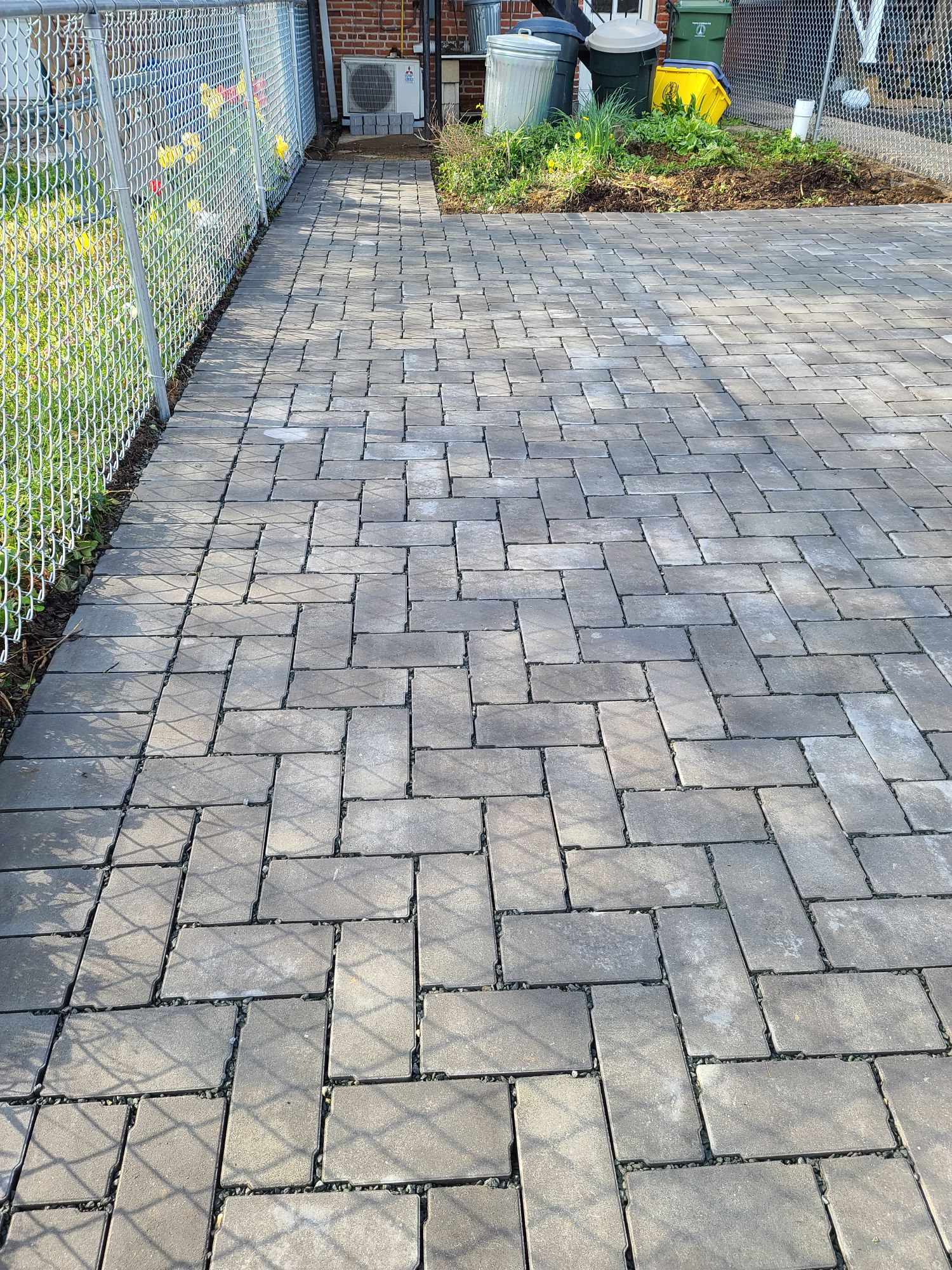 Custom Stoneworks & Design Inc. Permeable Pavers for a Driveway