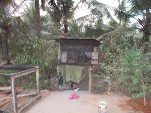 Typical village house  chicken roosting cage.