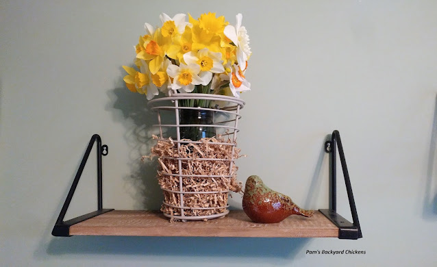 Here's how I combined a decor idea and an old chicken egg basket for an updated and refreshed spring look.