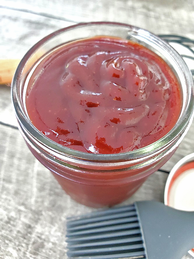 this is a barbecue sauce with jack daniels liqueur in a mason jar 