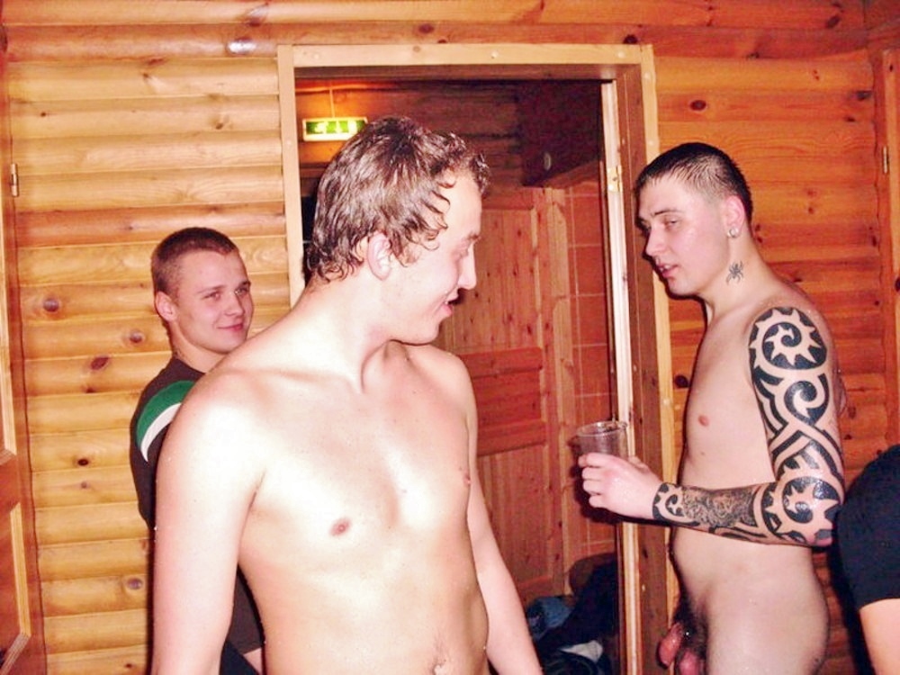 Guys enjoying getting naked together.