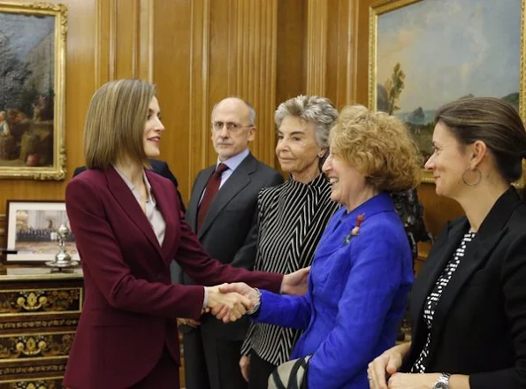 Queen Letizia of Spain attends several audiences at Zarzuela Palace, HUGO BOSS Bedina blouse, Carolina Herrera python pumps, Hugo Boss Jamayla  Blazer and Valessima Skirt 