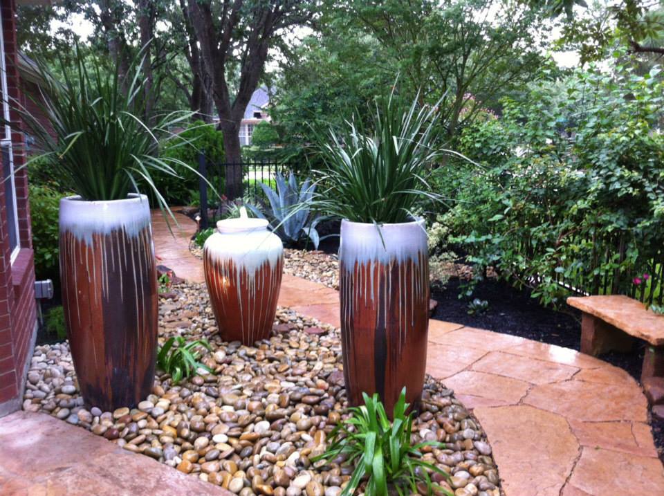 Laird Landscaping, Inc. Adding Beautiful Potted Plants To Landscaping