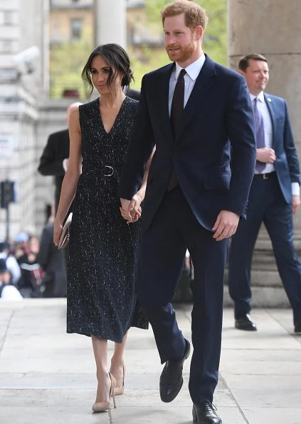 Meghan Markle wore Hugo Boss dress from Spring 2018 Ready-to-Wear Collection. Wilbur and Gussie Bespoke silk Clutch, Manolo Blahnik 'BB' pumps