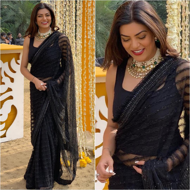 Sushmita Sen wearing a black saree 