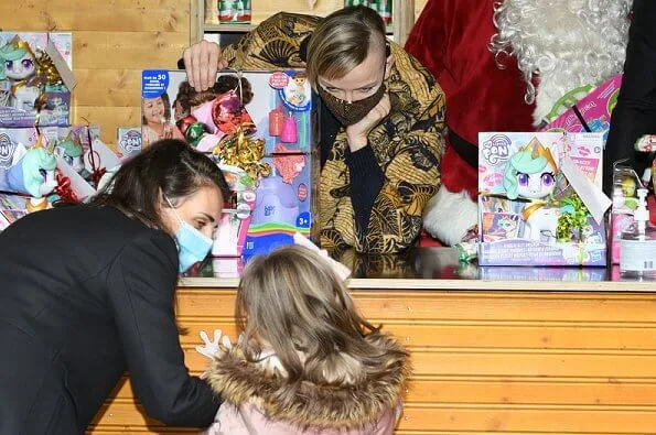 Prince Albert II, Princess Charlene, Hereditary Prince Jacques and Princess Gabriella. Princess Gabriella wore a new floral print raincoat from Jacadi