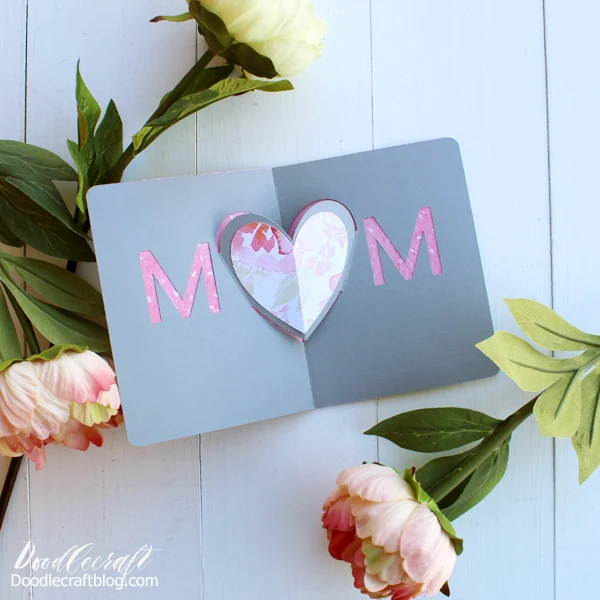 Make a gorgeous heart pop-up card for mother's day using the Cricut Maker and floral paper.
