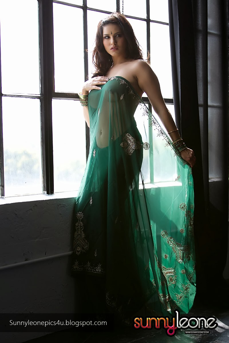 Sunny Leone Strips Her Transparent Green Saree-9407