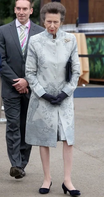 The Countess of Wessex wore a new blouson sleeve knit midi dress from Victoria Beckham. Princess Anne and Princess Alexandra