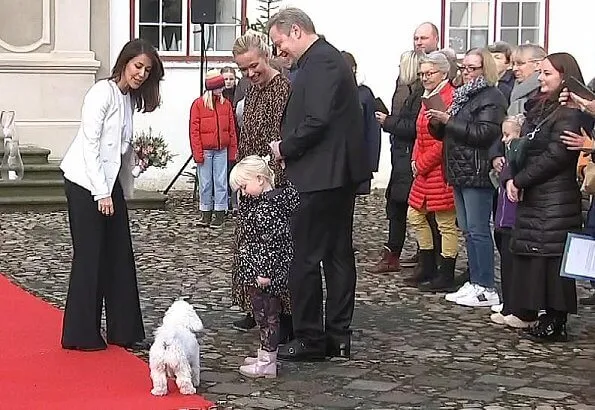 Princess Marie wore a tricotine jacket by Emporio Armani, and a new silk blouse by Hugo Boss